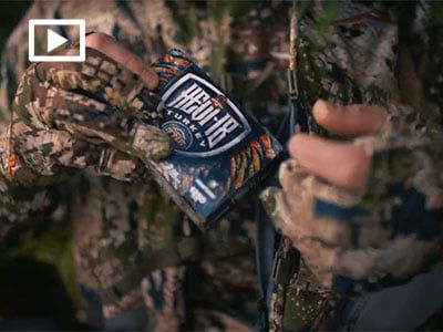 hunter holding box of HEVI-18