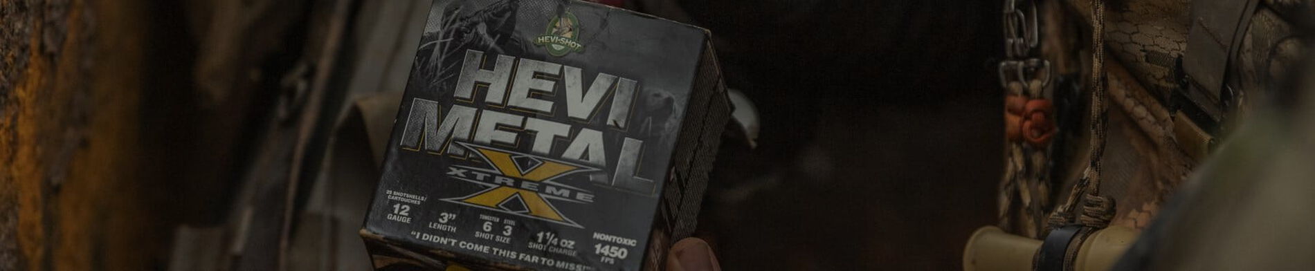 HEVI-Metal Xtreme shotshell being pulled from a box
